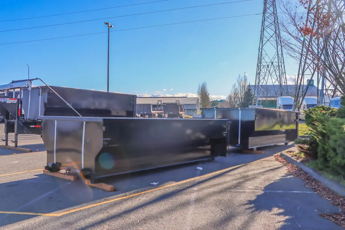 Roll-off dumpster ready for waste disposal at job site for Demolition Dumpster Rental in Libertyville